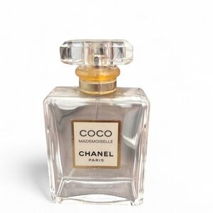 CHANEL Coco Mademoiselle Fragrance Bottle with Gold and Clear Design
